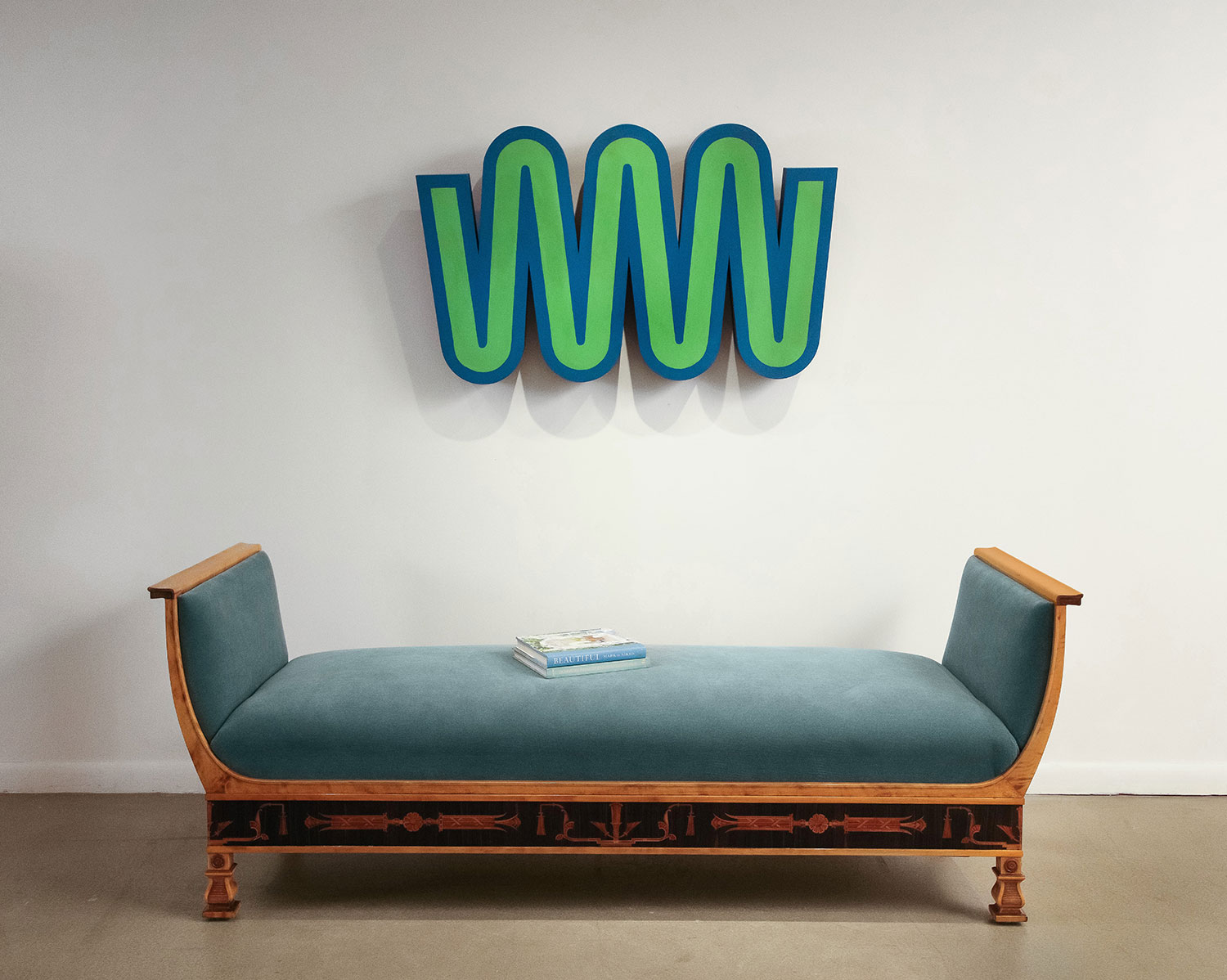 nydc gallery teal lounge with green blue modern artwork