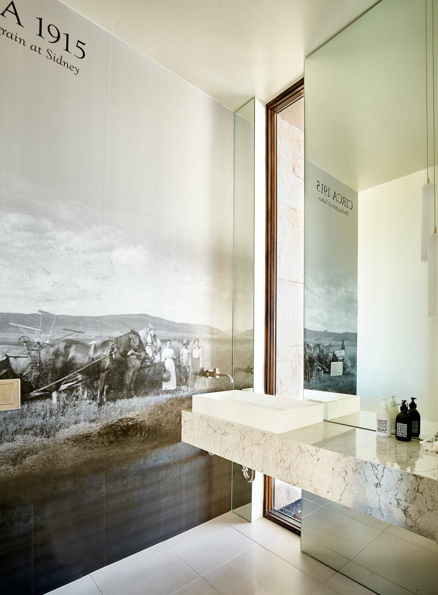 modern powder room with custom wallcovering from historical photo