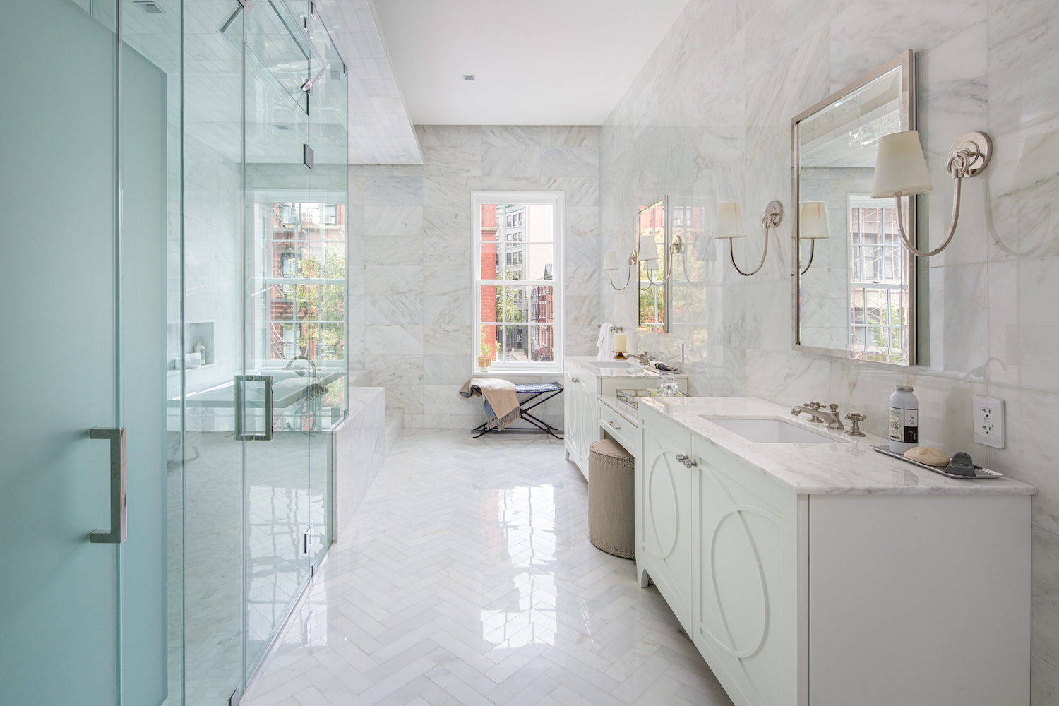 bathroom with marble walls and flooring