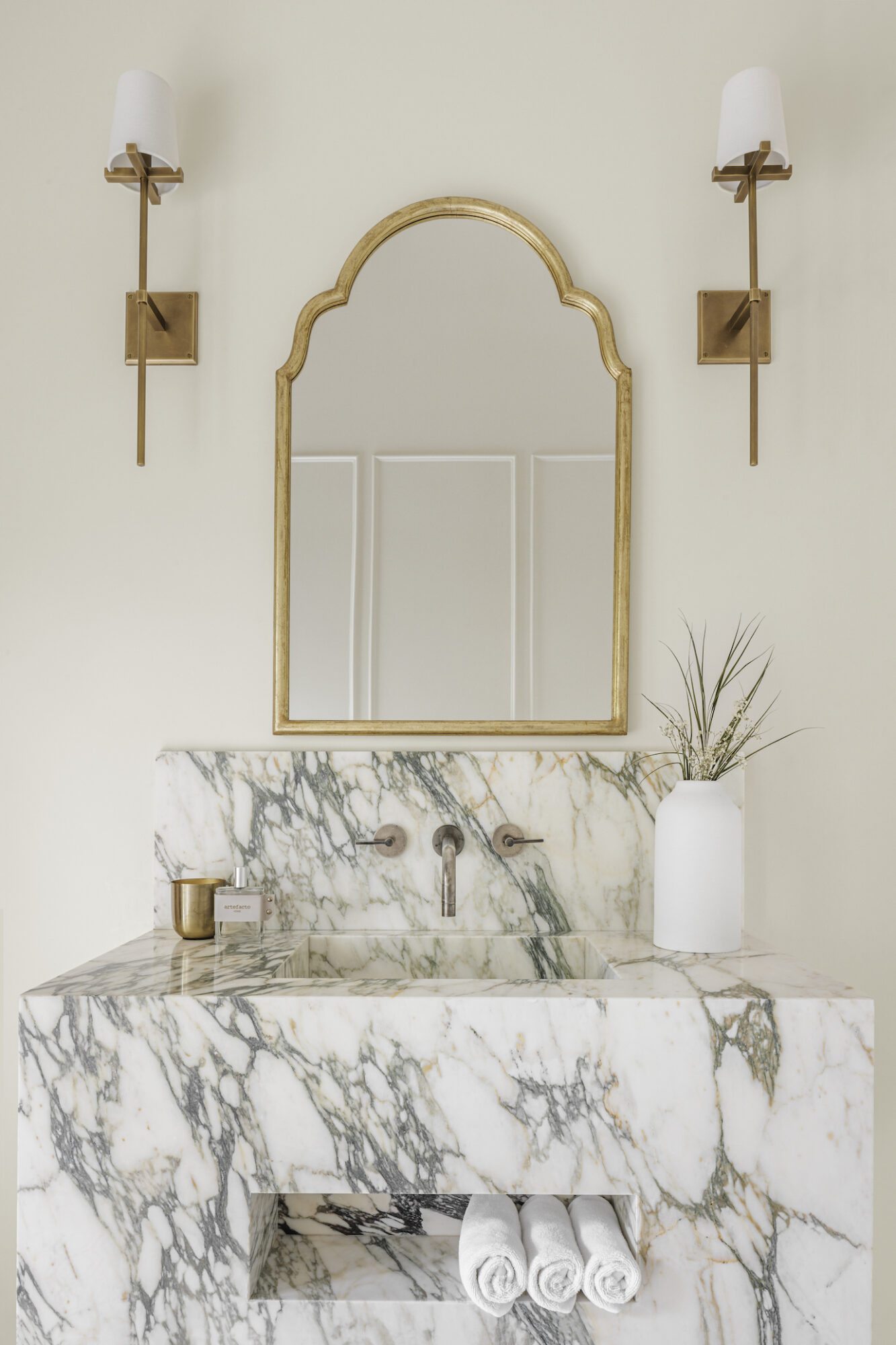 bathroom vanity featuring natural stone