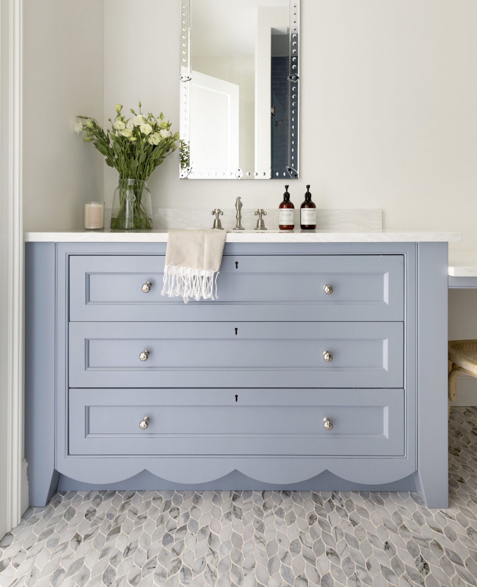 powder blue bathroom vanity with scalloped edges 