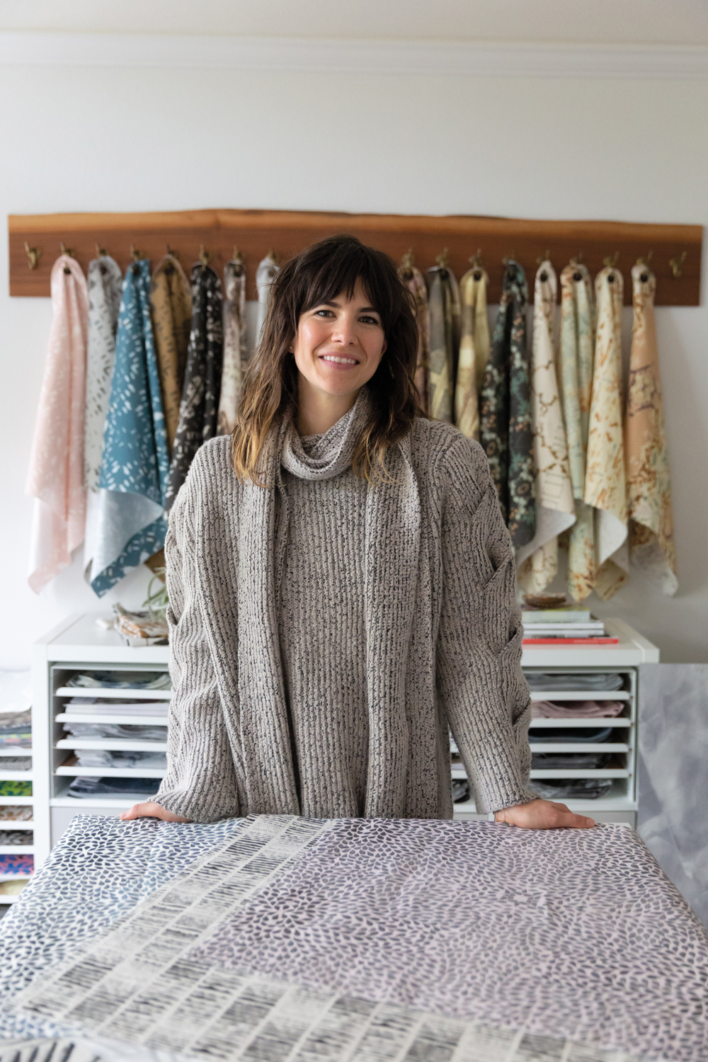 Portrait of artist and designer Kate Miller in her textile studio.