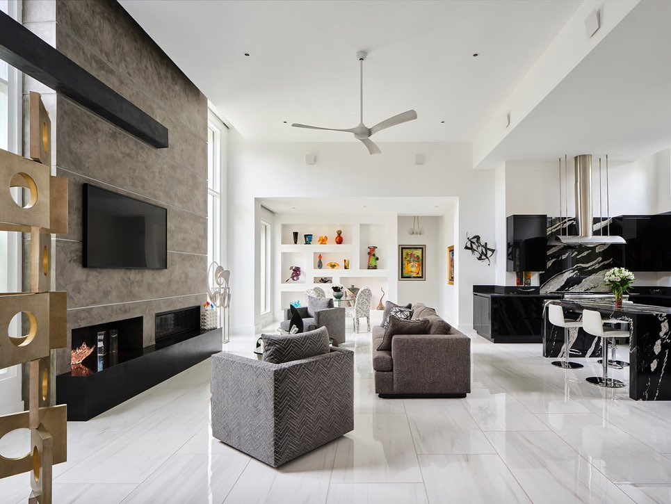 Large living area featuring white large tiles.