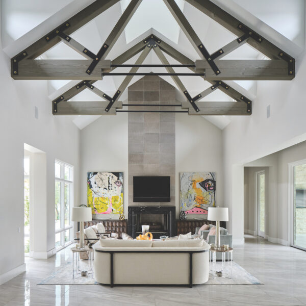 Vaulted ceilings with wood beam features in this living room.