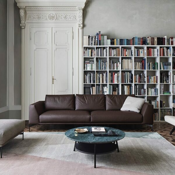 Sleek chocolate sofa featured in living room.