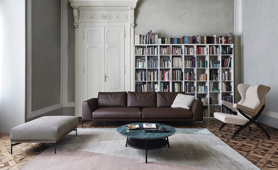Sleek chocolate sofa featured in living room.