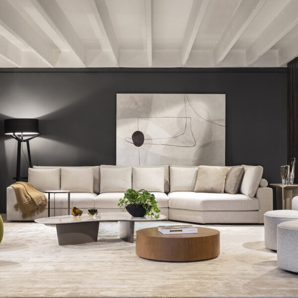 white ceiling, black wall paint, round coffee table, white couch