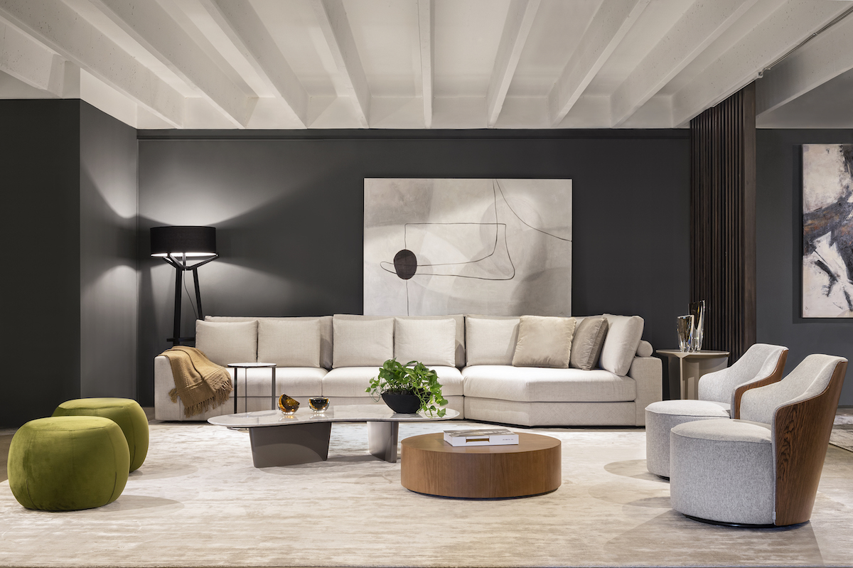 white ceiling, black wall paint, round coffee table, white couch