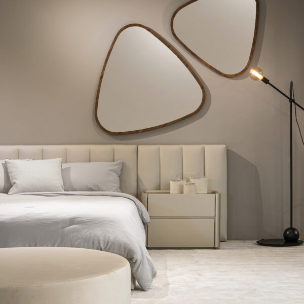 abstract wall mirrors, white bed, ivory headbard