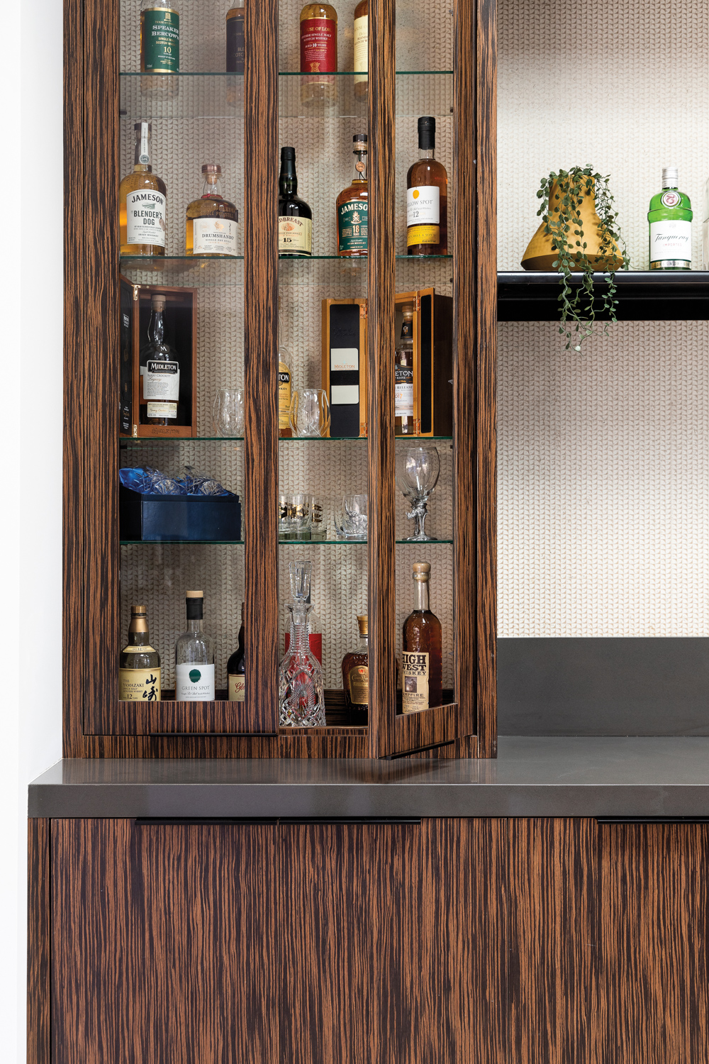 a built-in bar with a...
