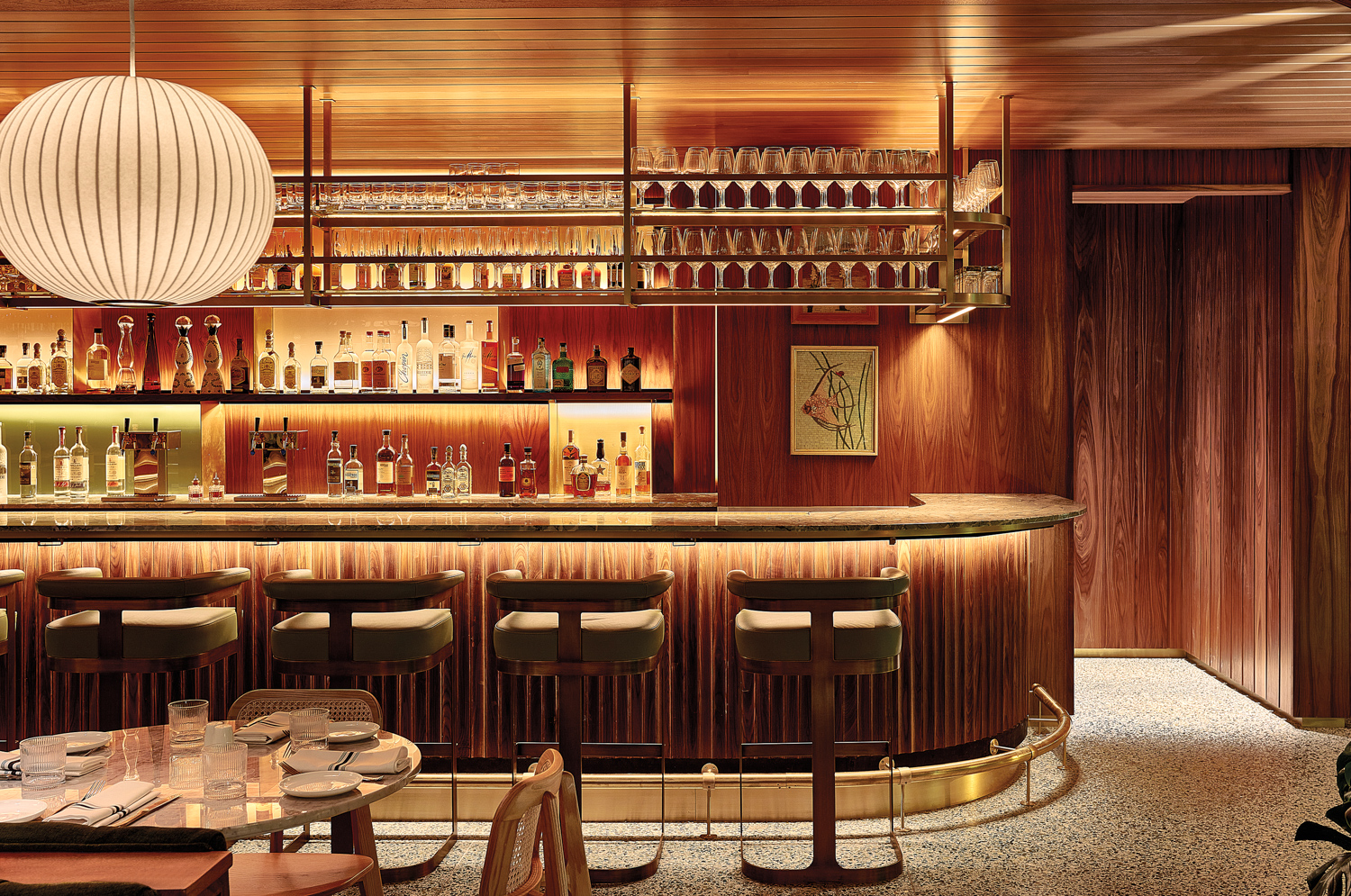 Bar of Porta Via restaurant with wooden bar, walls and ceiling at Porta Via Palm Desert 