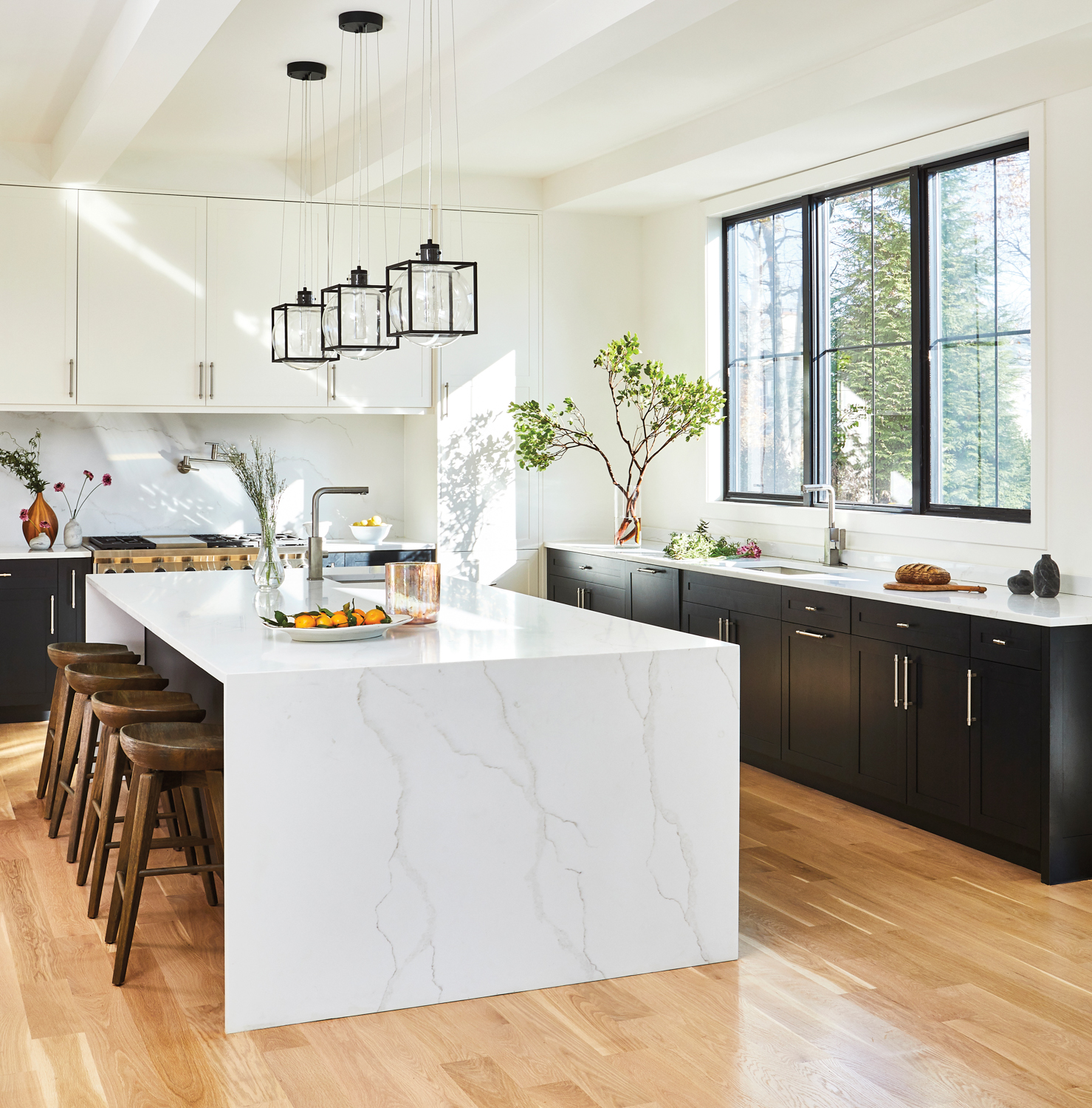 contemporary kitchen with marble island and natural light
