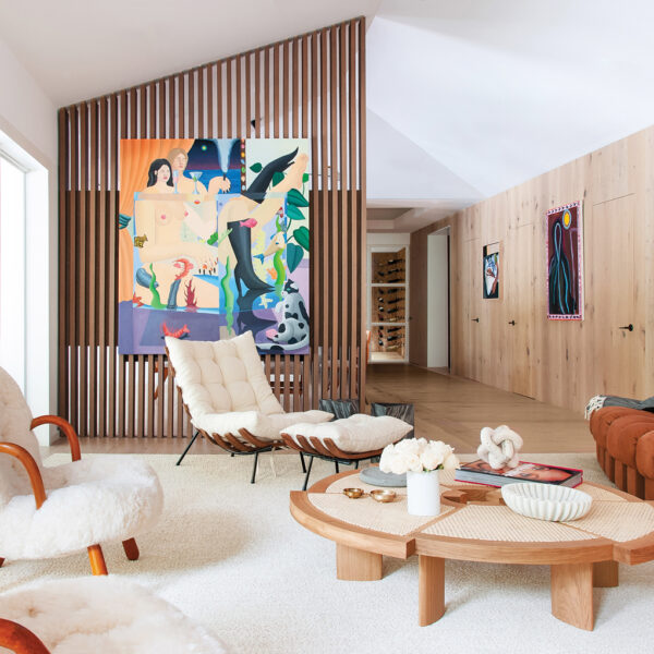 Modern Art And Vintage Furnishings Coexist In A Fun Miami Home – Living Room With Wood Screen, Vibrant Art, White Armchairs And Lounge Chair