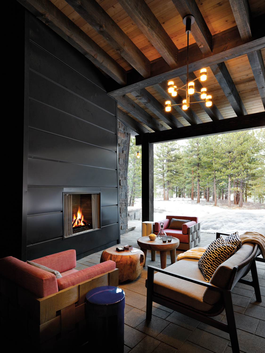 An outdoor space features a fireplace.