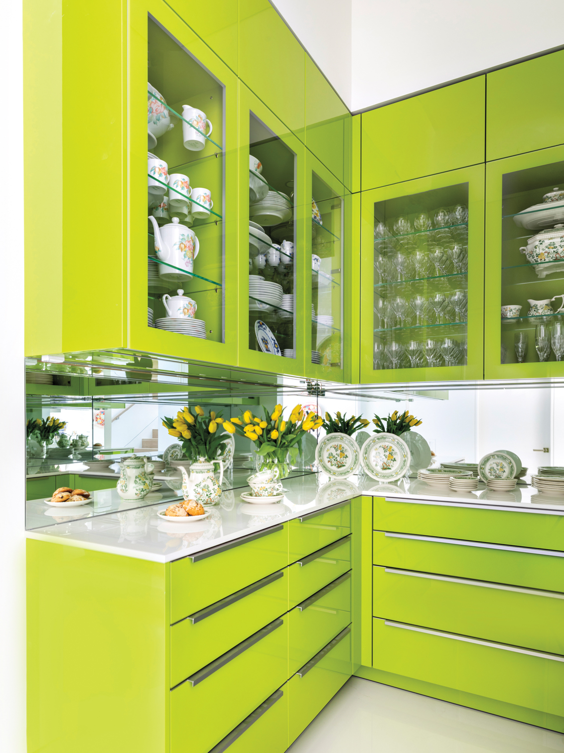 pantry featuring bright green cabinetry
