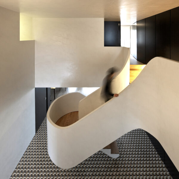 Large white staircase, geometric flooring