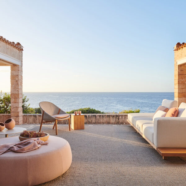 outdoor patio with modern white sofa outdoor furniture at coastal home by Studio471