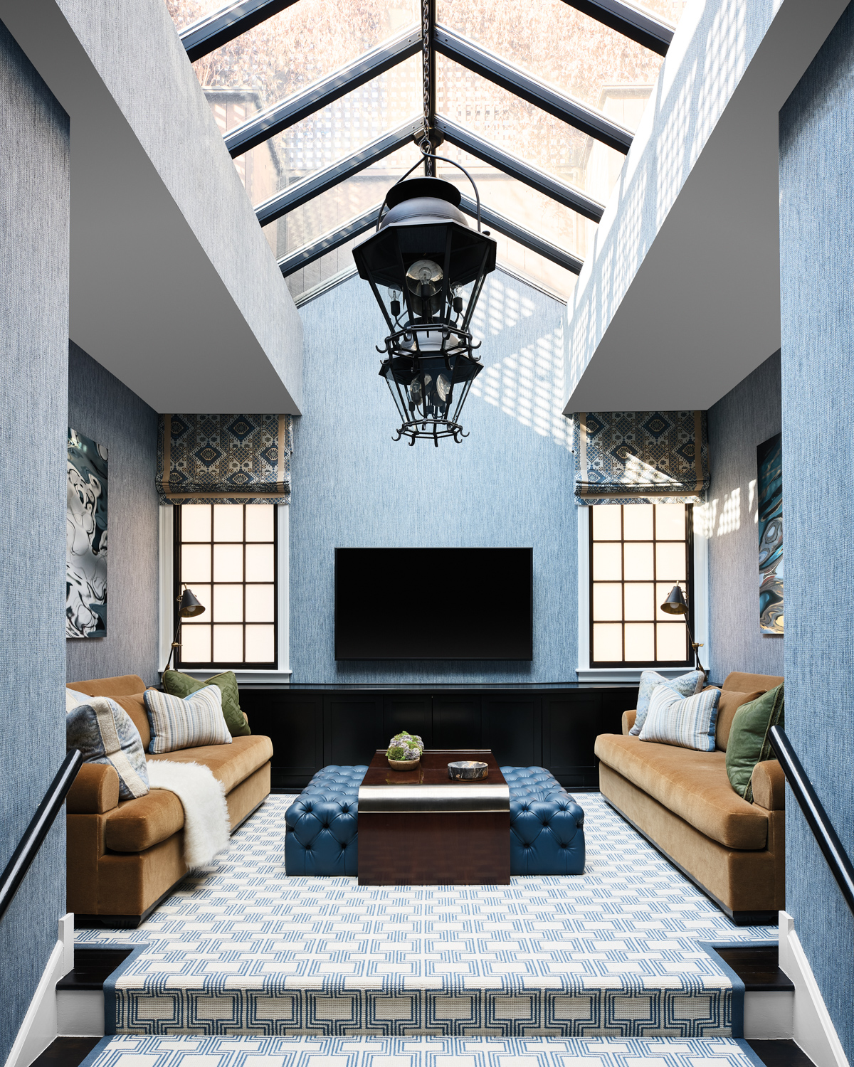 family room with blue grasscloth...