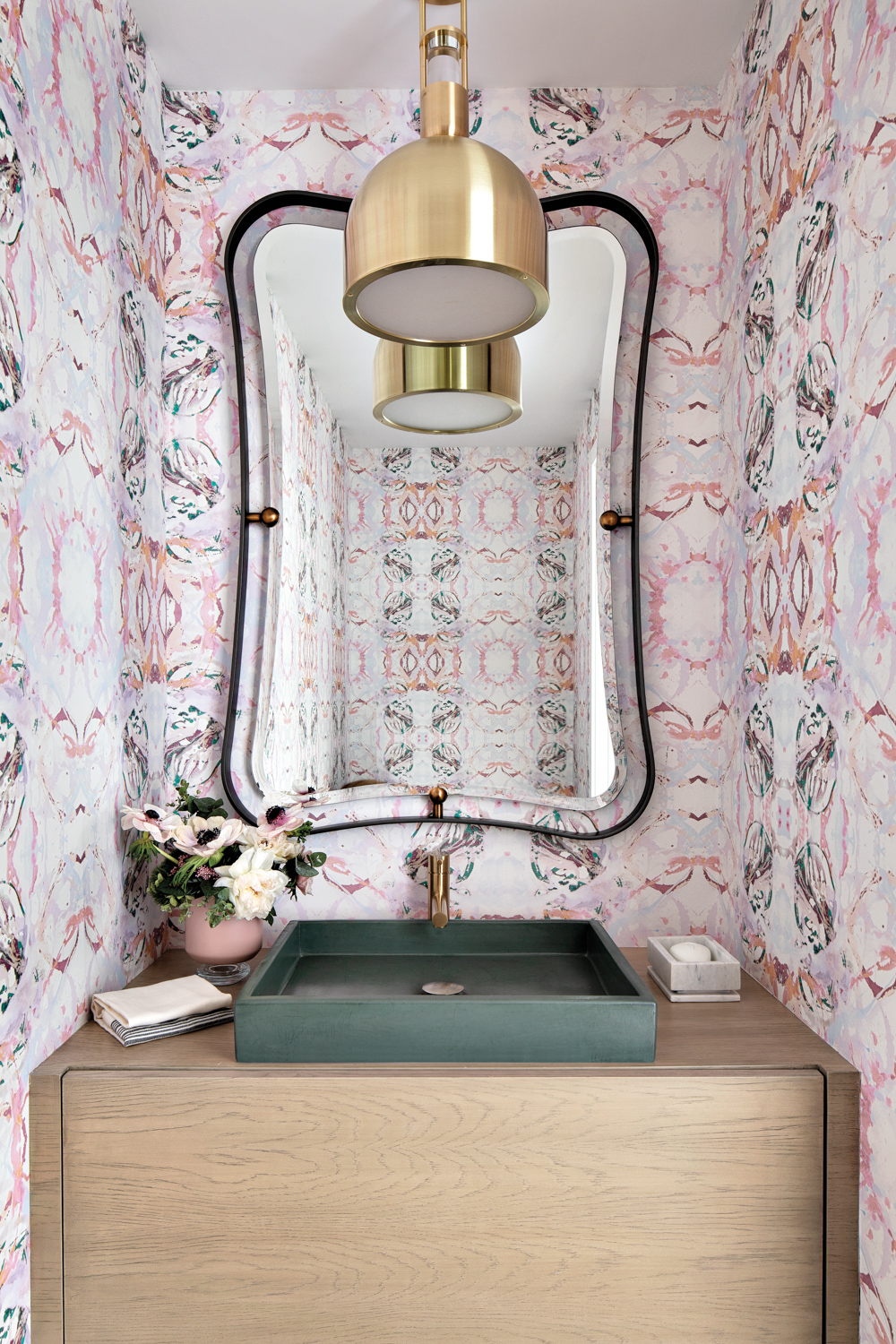 powder room with pink patterned...