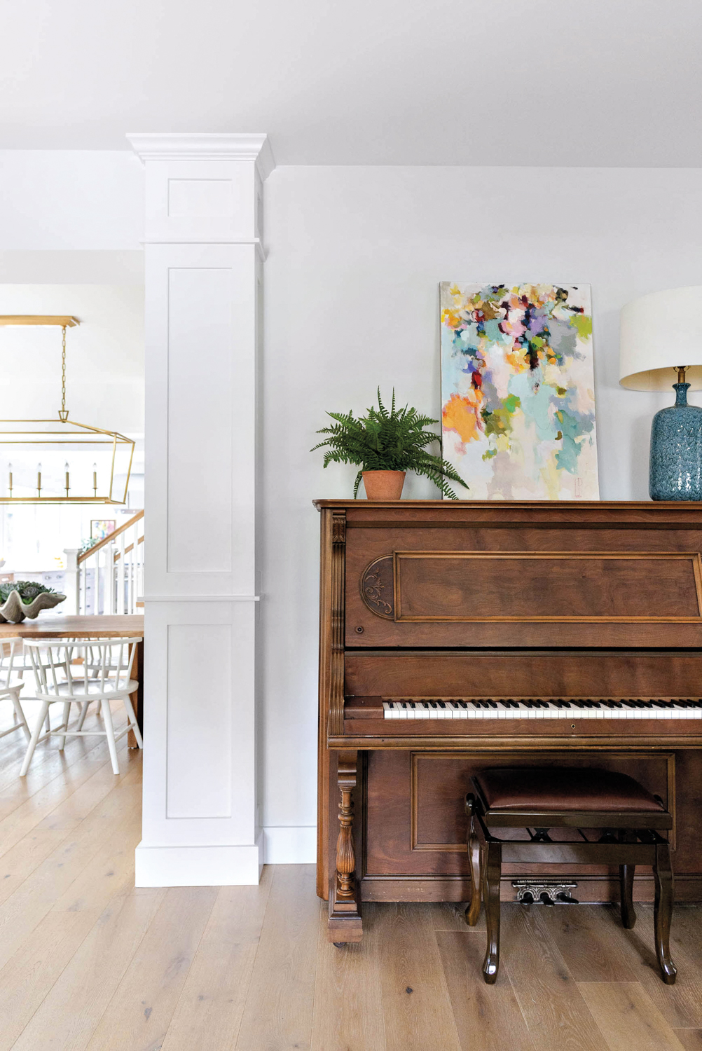 entry room with piano, abstract...