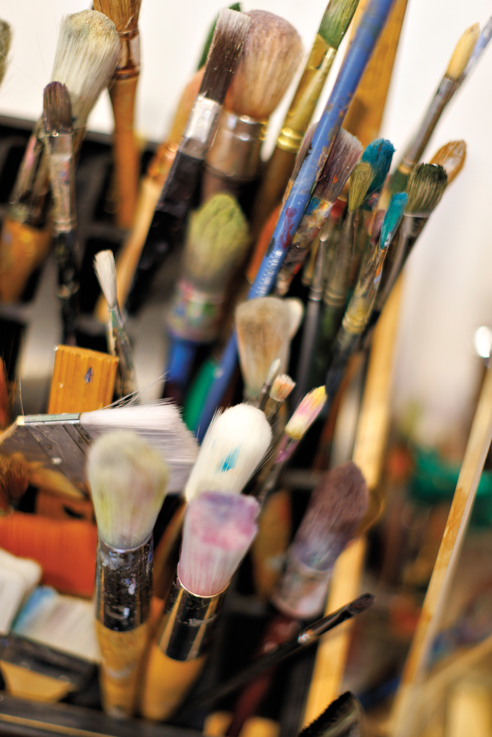 collection of paintbrushes in carmelo blandino's studio