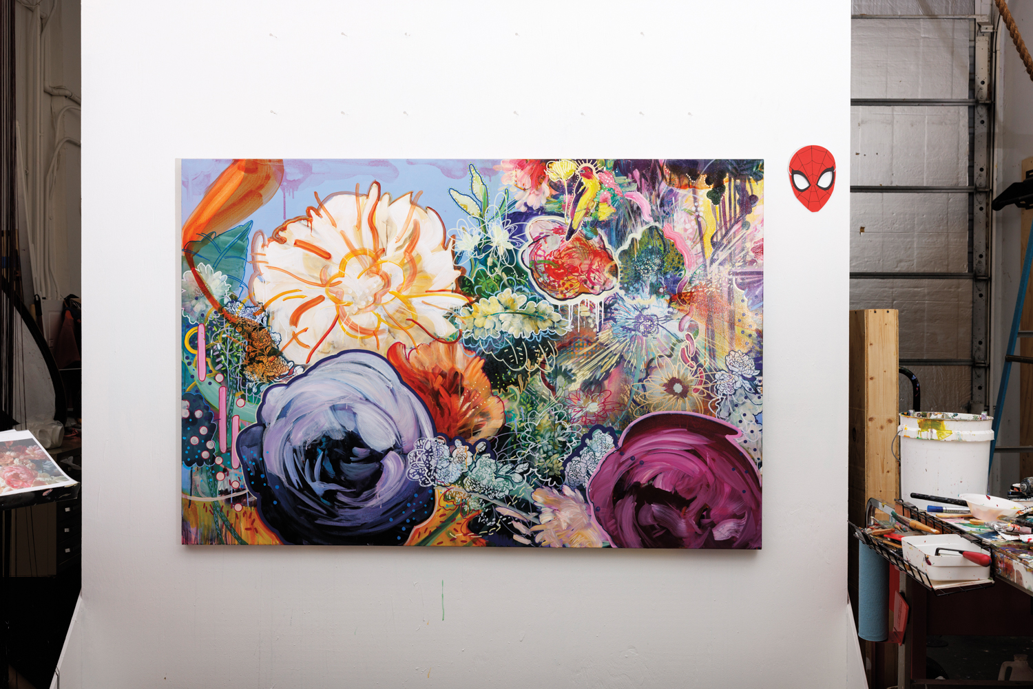 flower portrait by carmelo blandino hanging on his studio wall