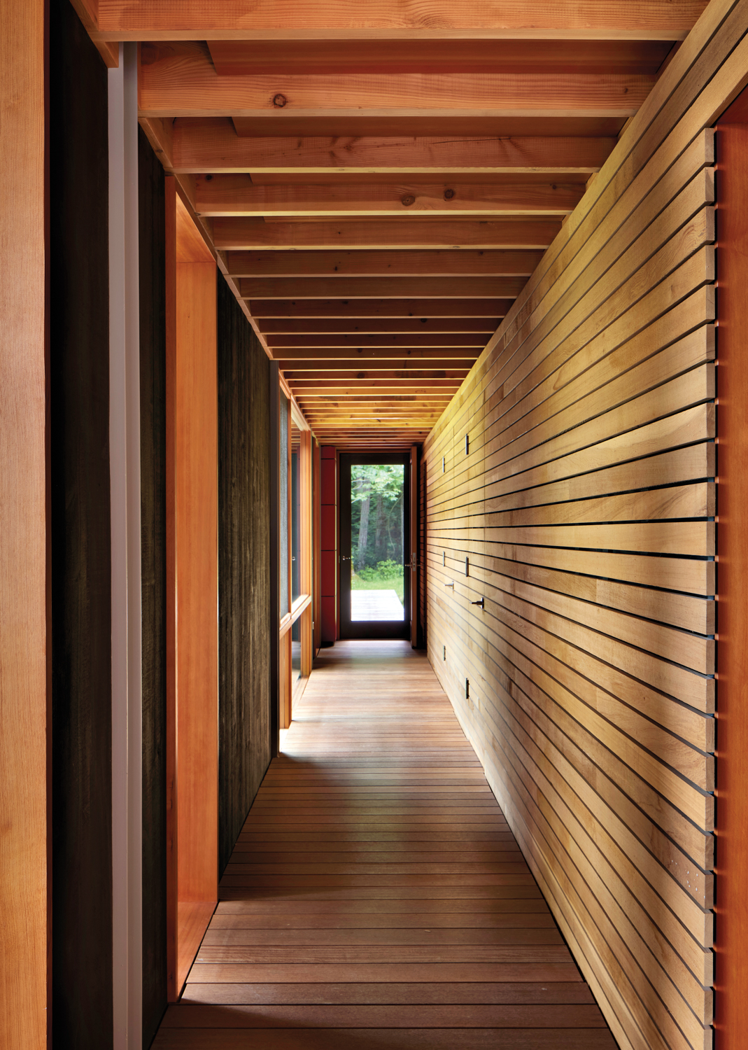 Wood paneled hallway to master...