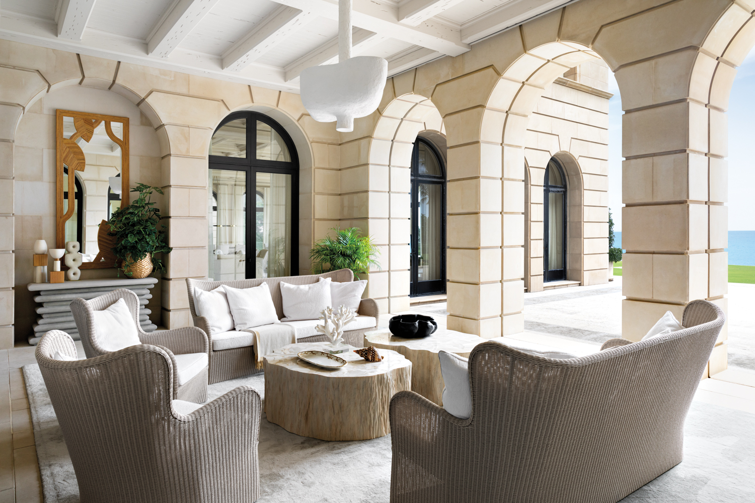 loggia with sofas, armchairs, abstract-shaped...