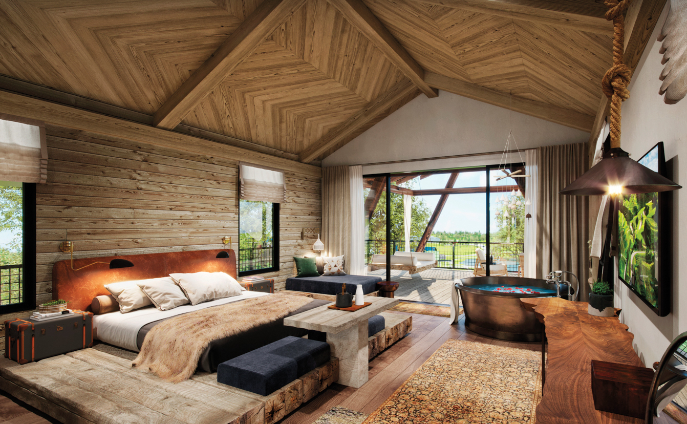 vaulted, herringbone-patterned wood ceiling with shiplap walls and bed at southeast resort getaway
