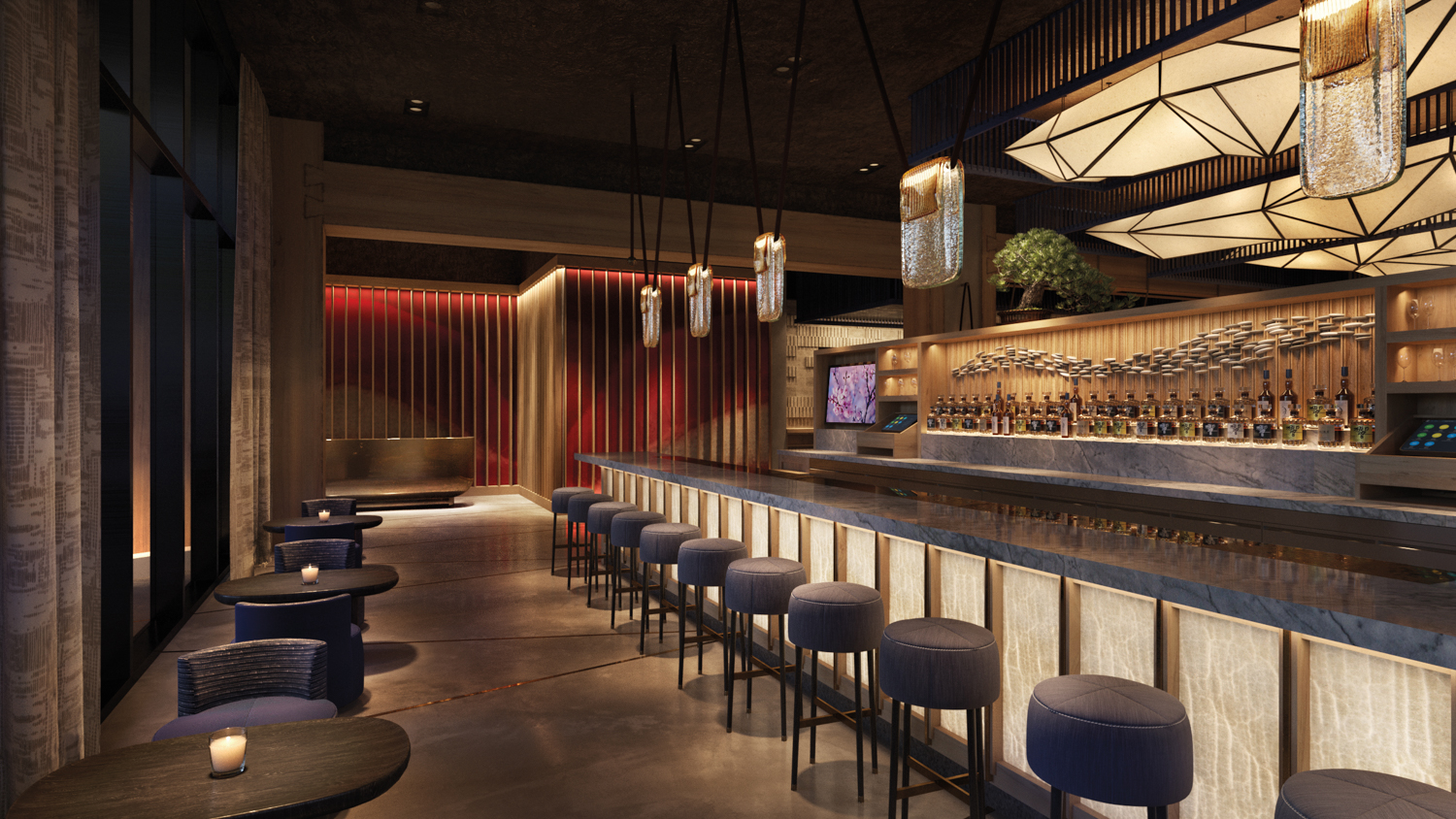3 low tables settings parallel to a long hotel bar lined with stools covered in dark-blue fabric with pendants above