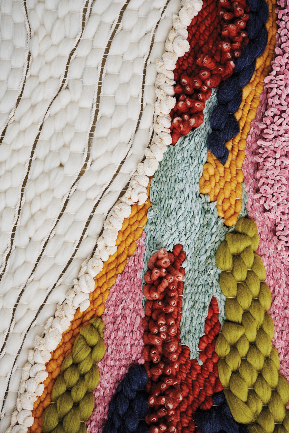 Shaylee Southerland’s woven work featuring fibers in various colors and textures
