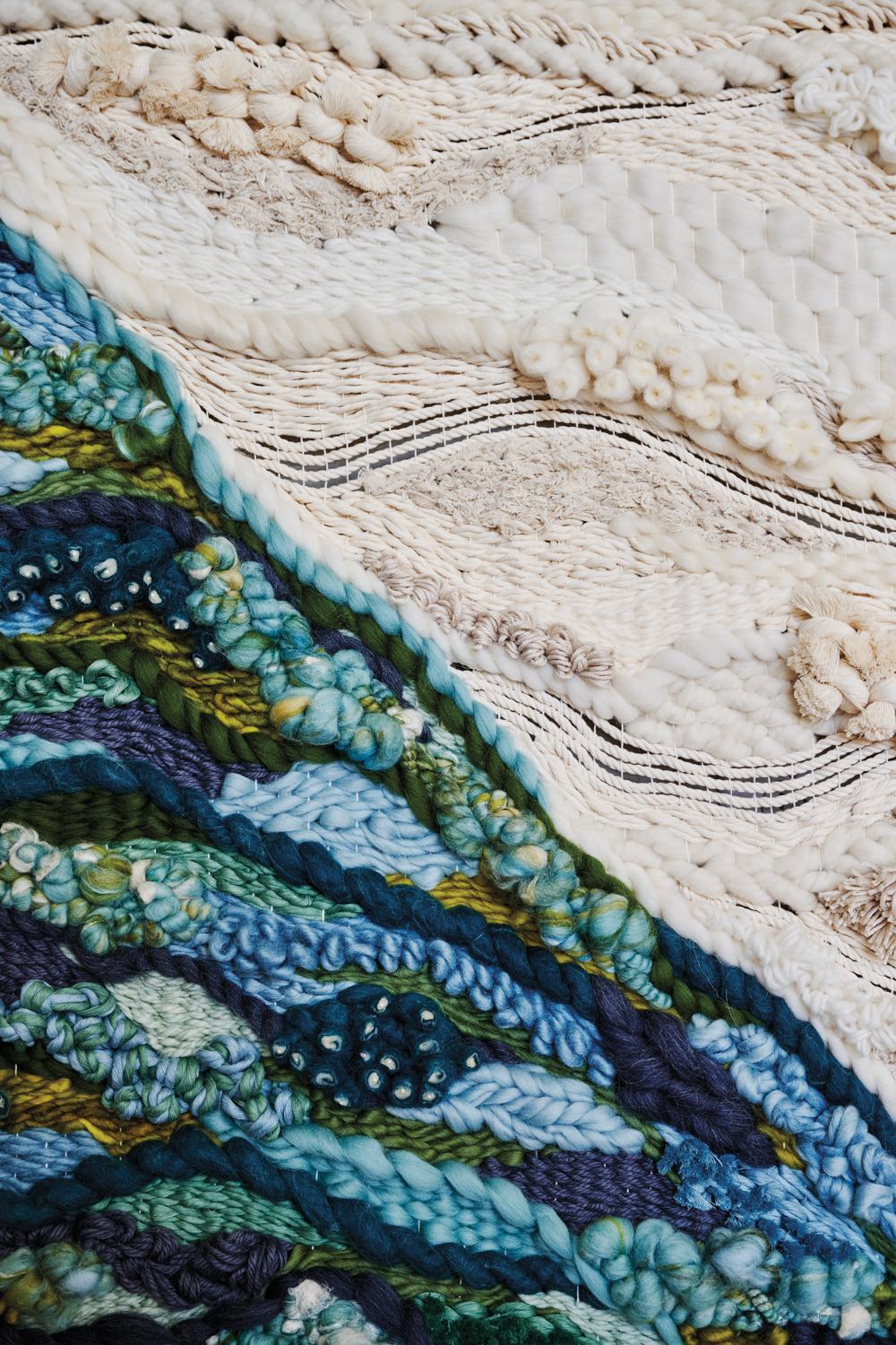 Shaylee Southerland’s woven fiber work with revealed vertical warp threads
