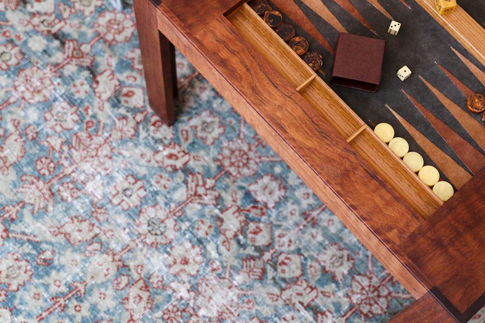 traditional living room rug and backgammon table in Los Angeles home by Lawrence of La Brea