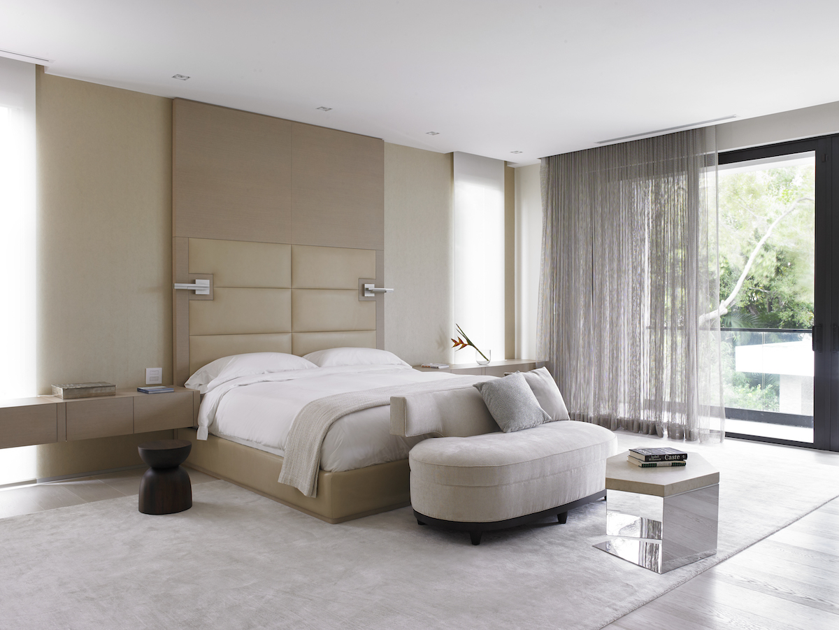 Beige bedroom, long wall coverings, large area rug