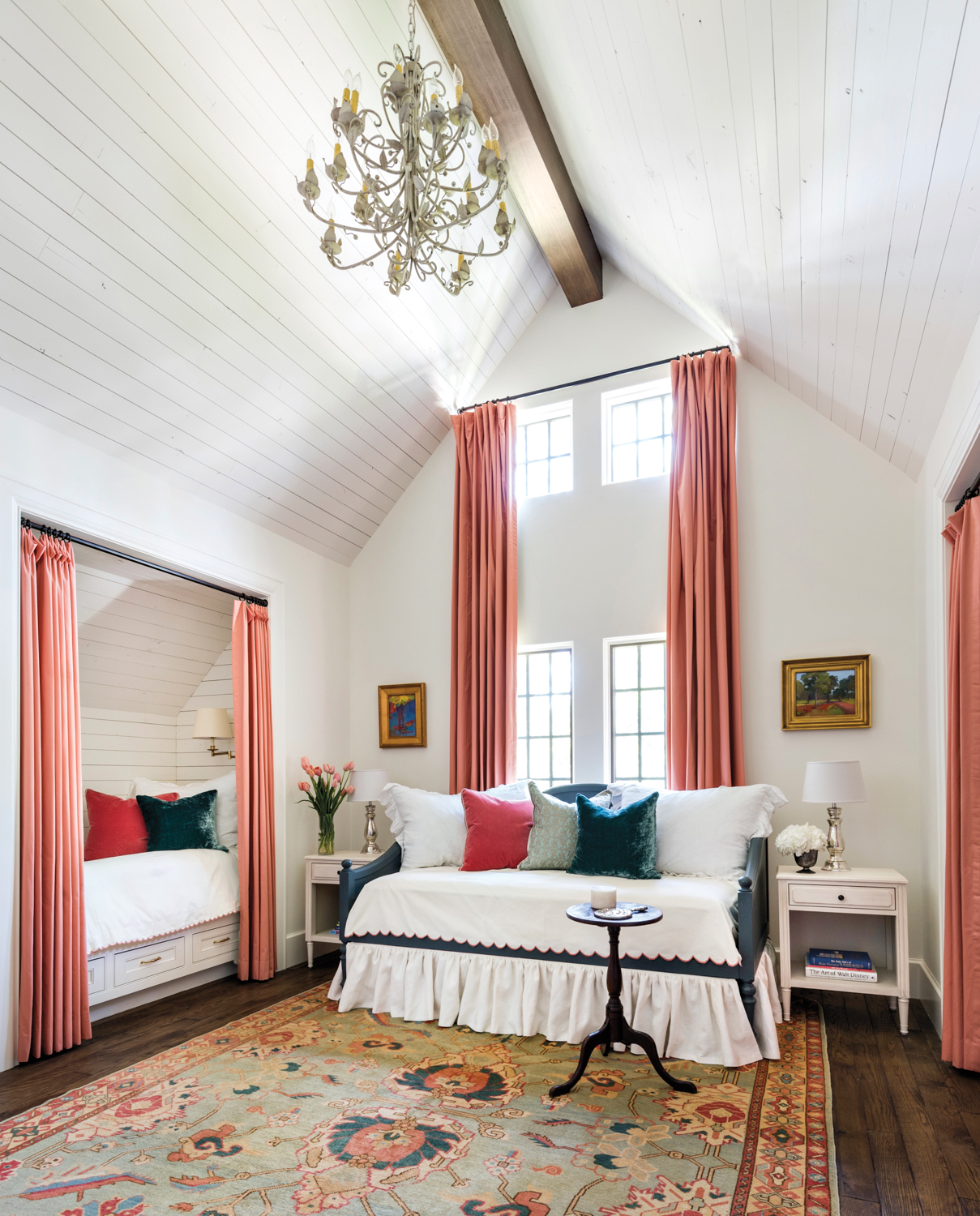 Bedroom with white ceiling and coral-colored draperies by Texas female design pro Erin Stetzer