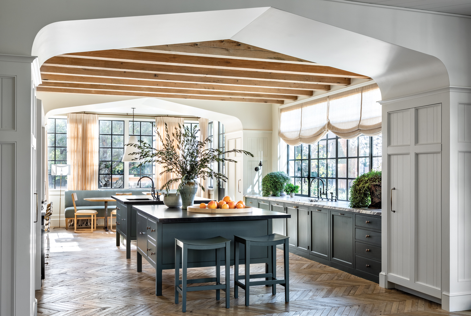 kitchen with a Tudor-style arch,...