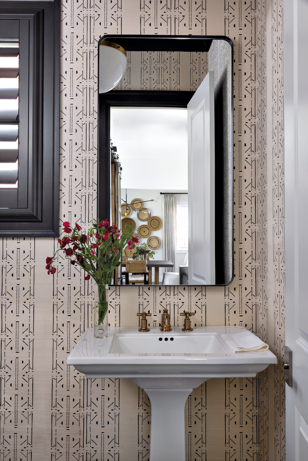 powder room with black painted...