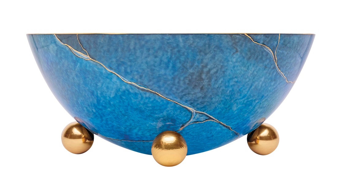 blue bowl with gold footers
