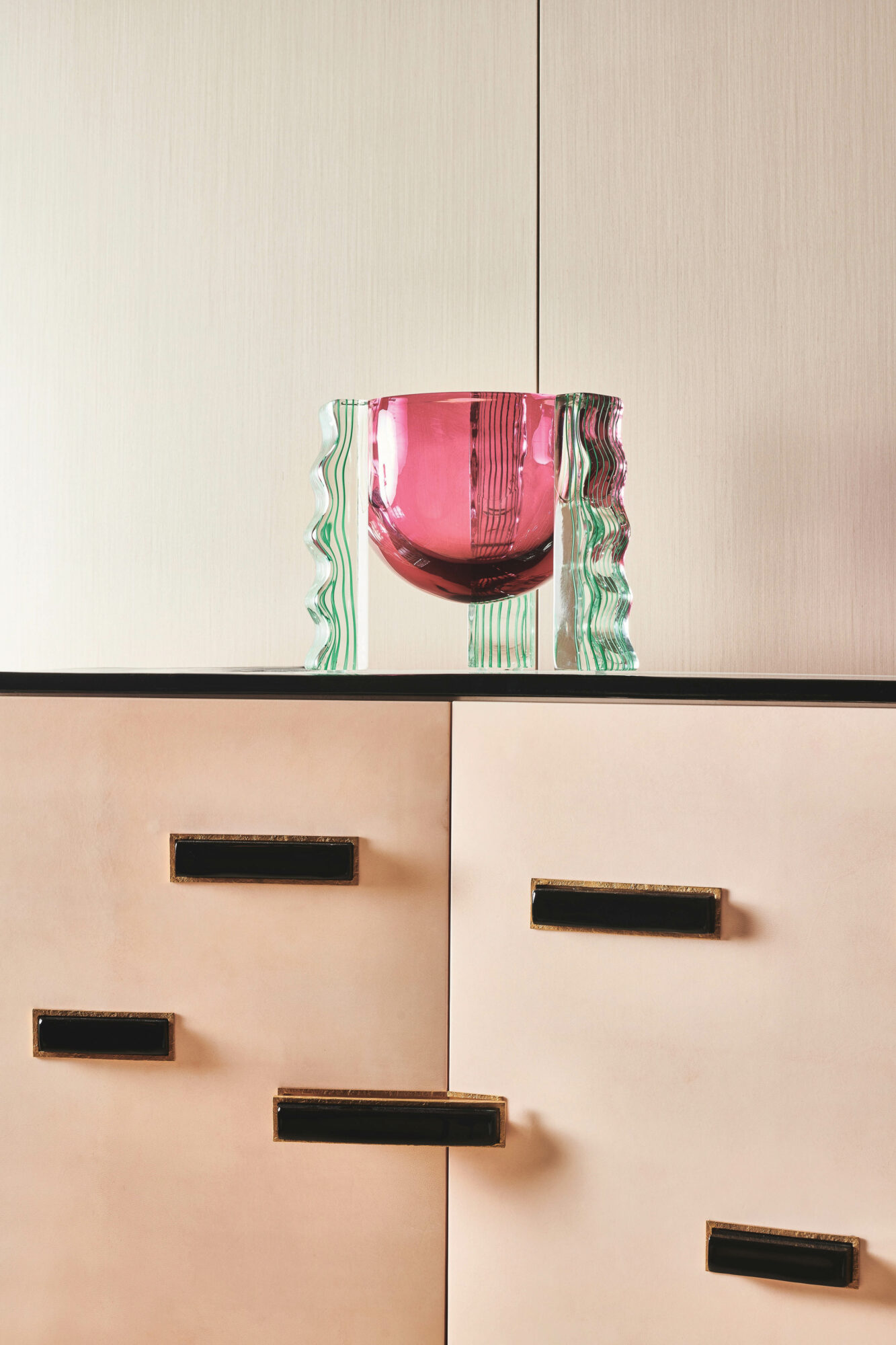 Abstract pink-and-green glass vase shown in Achille Salvagni Atelier, part of the New York art scene