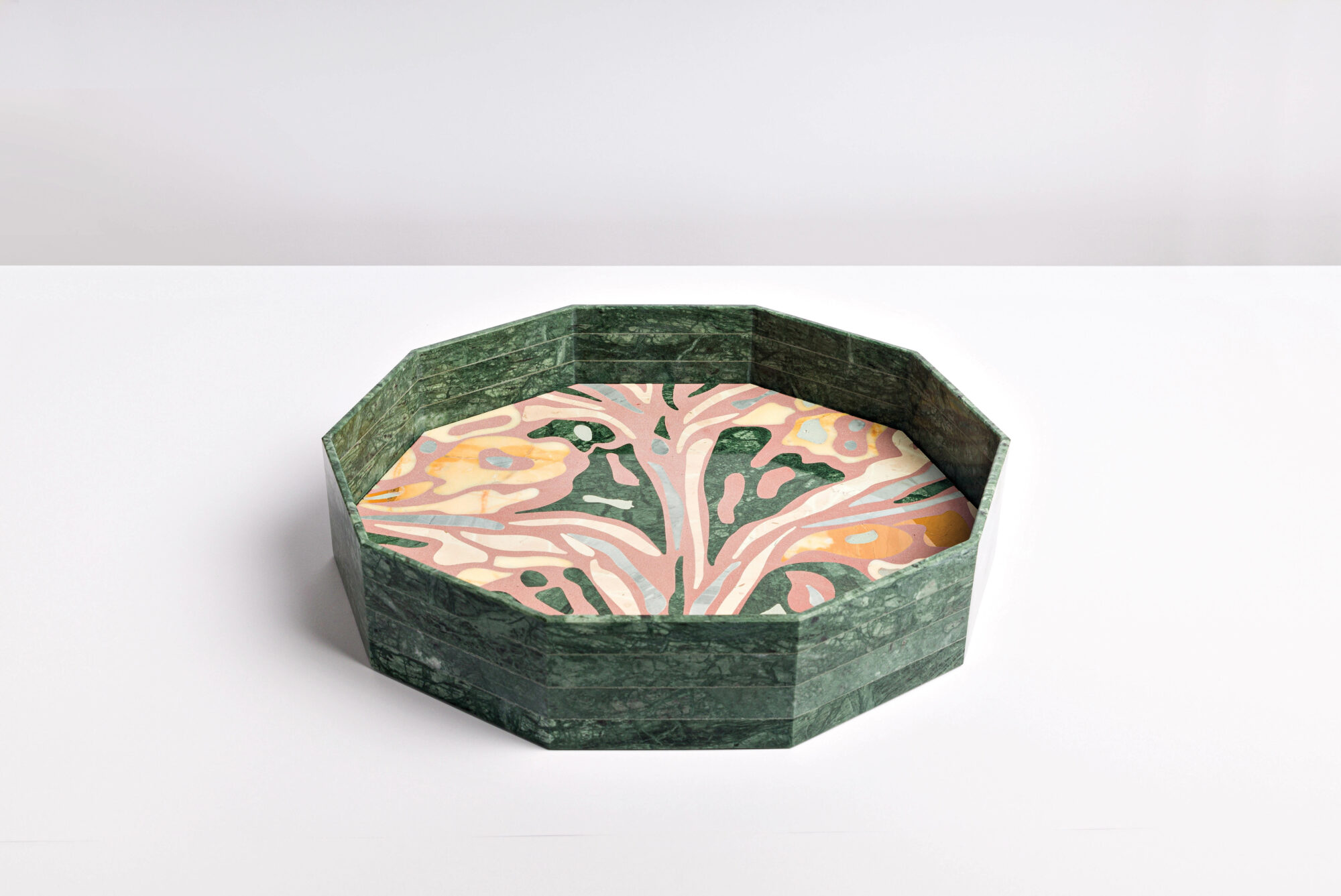 Decagonal plate with green-marble border from Artemest Galleria, part of the New York art scene
