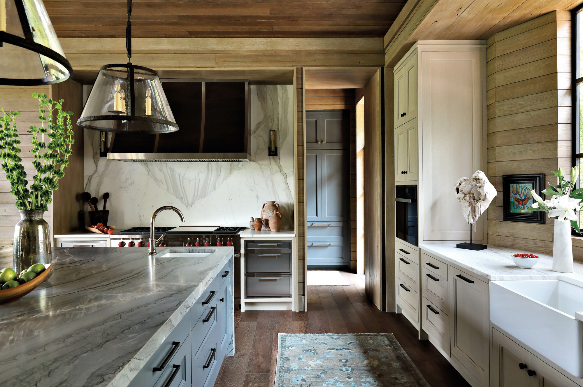 Large kitchen with a gray-blue...