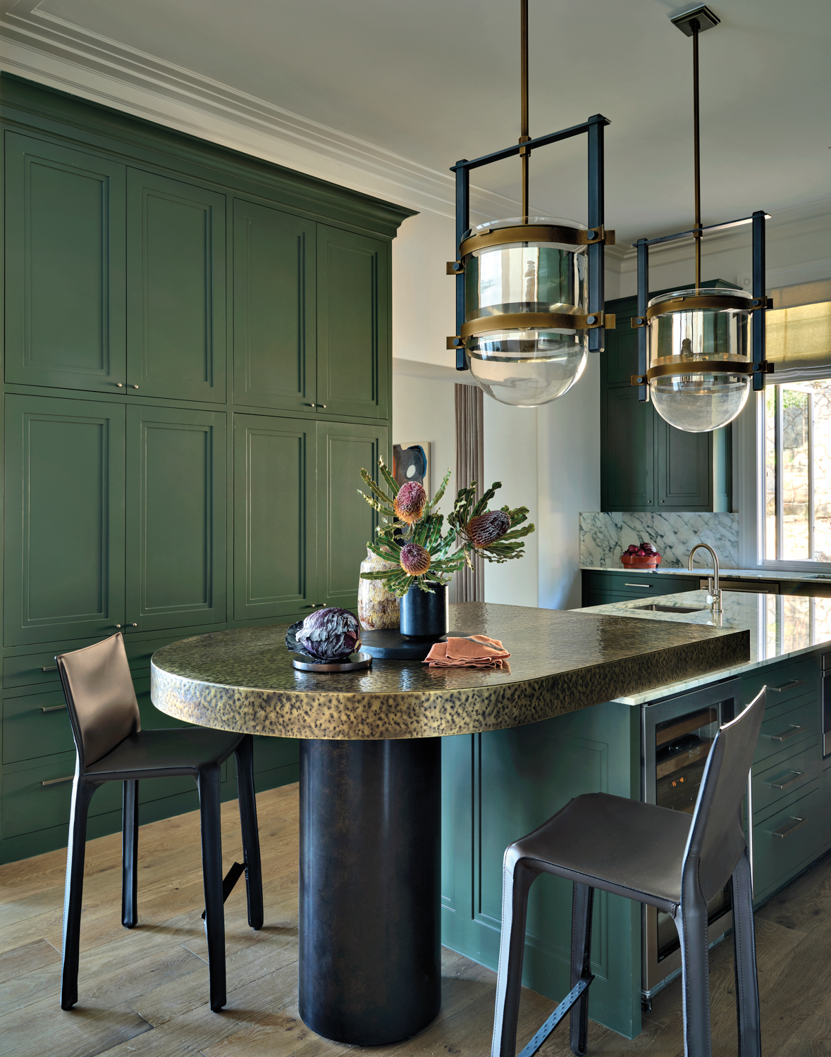 kitchen with green cabinetry and...