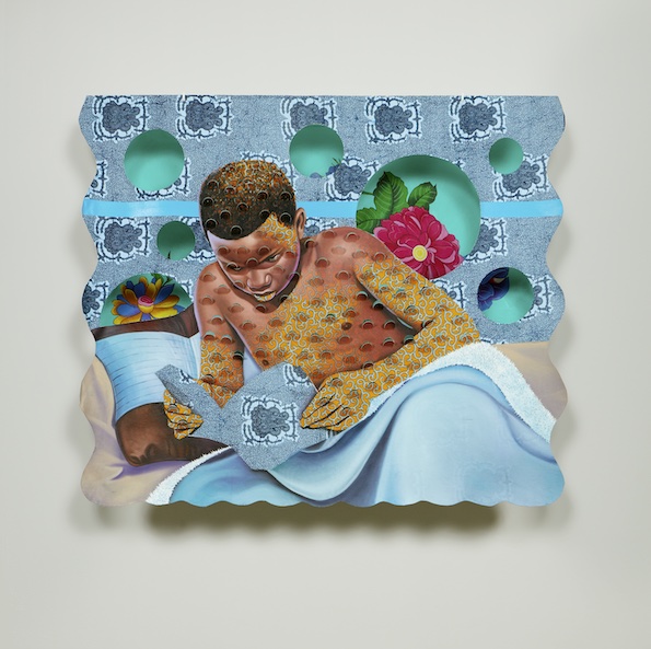 Art of boy reading in bed mounted on a blank wall on display at 'Narrative Threads: Fiber Art Today'