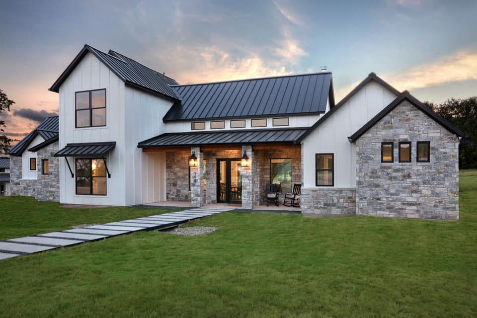 Contemporary outside elevation of home with stone accents