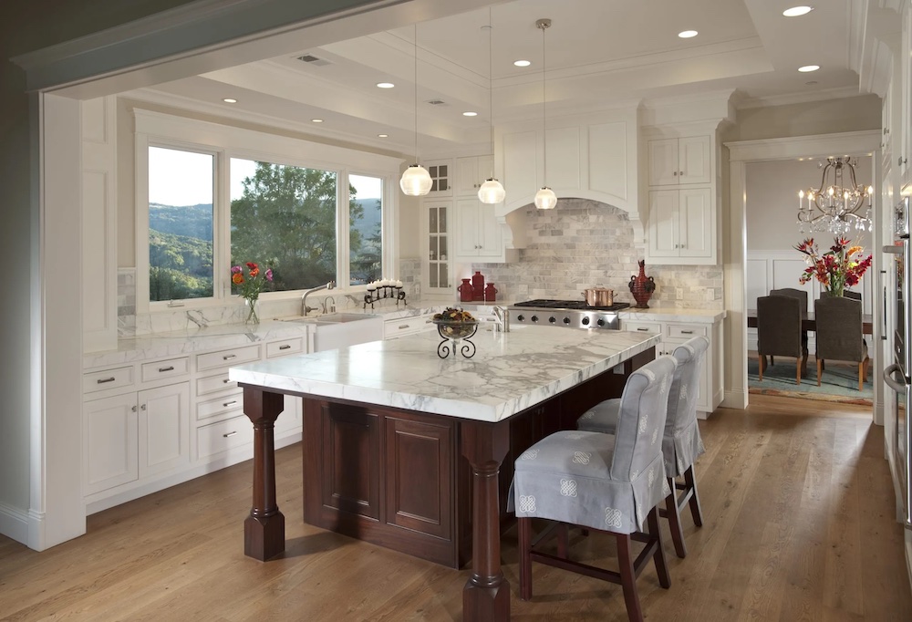 Interior design and architecture in Northern California kitchen with marble countertops and white cabinets.