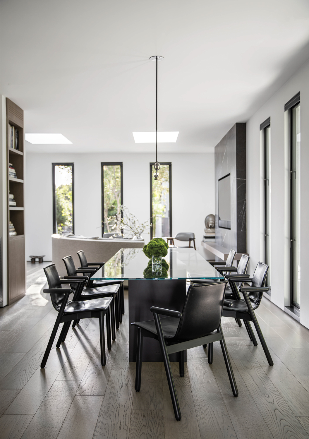 dining area with steel-and-glass table,...