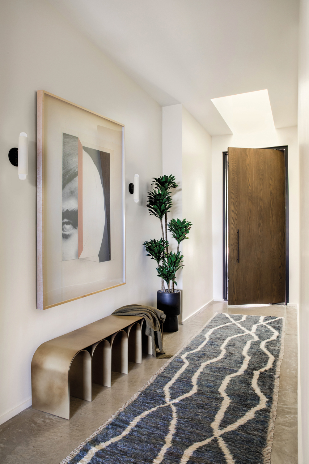 Entry with Moroccan-style gray runner,...