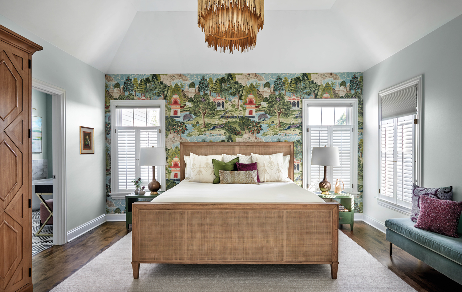 bedroom with garden-inspired wallpaper, rattan...