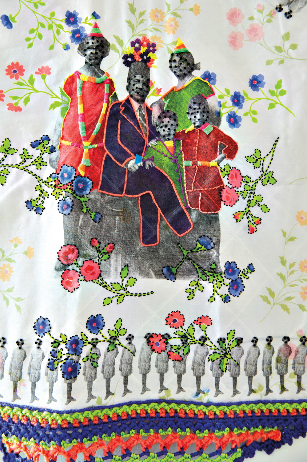 An embroidered cloth with photo tranfer images of a family