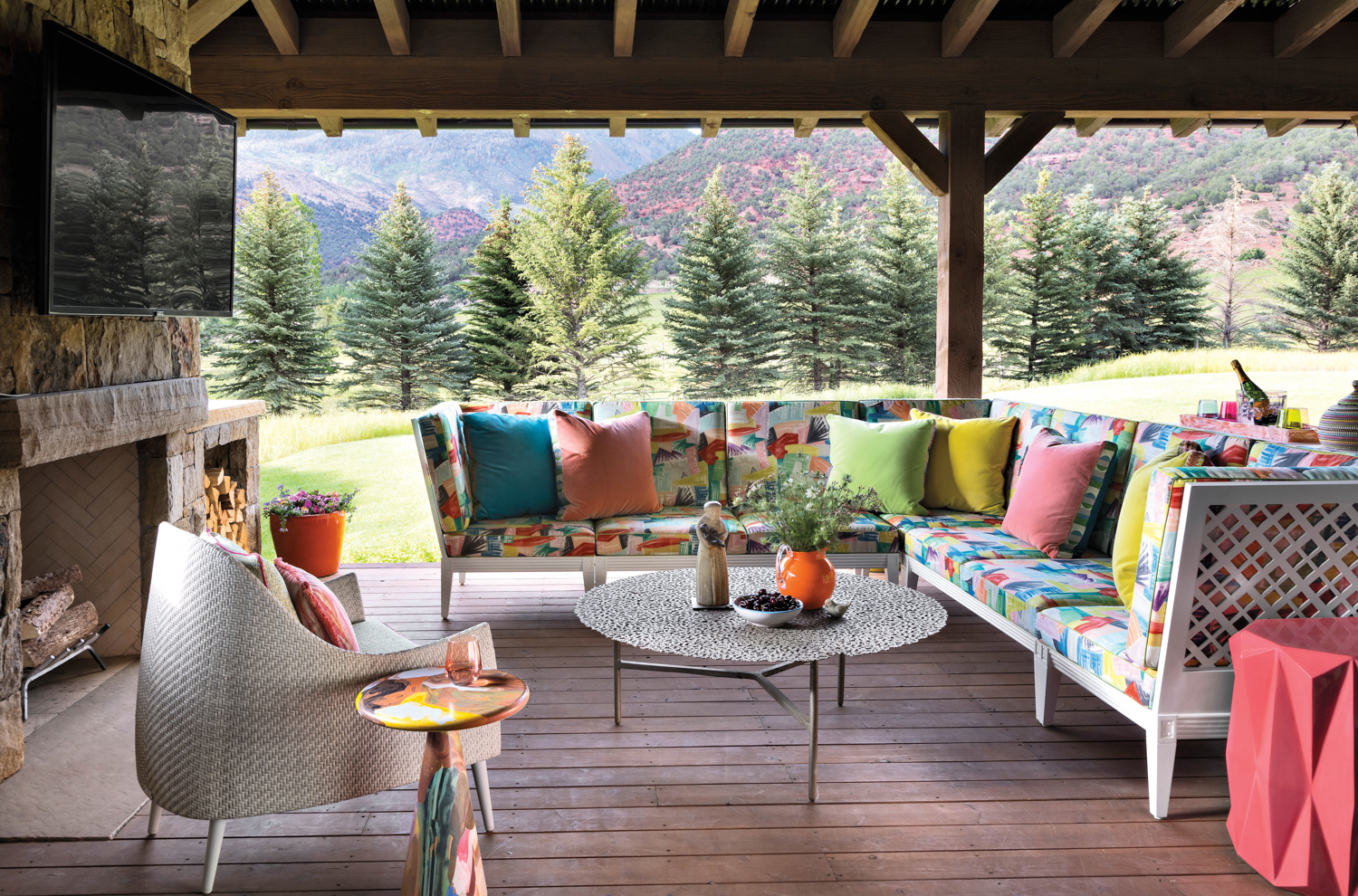 Porch with colorful outdoor sectional,...